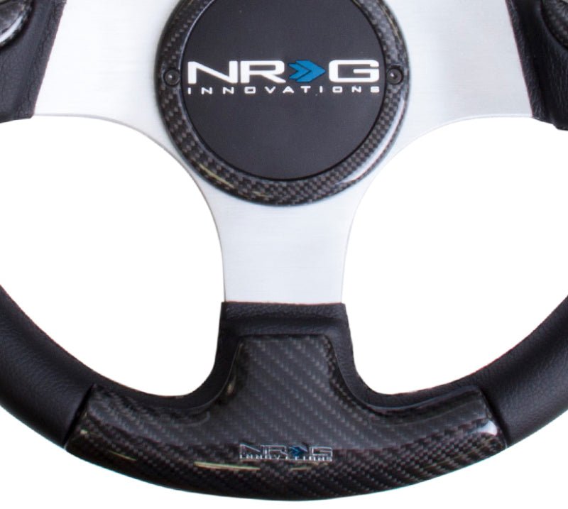 NRG Carbon Fiber Steering Wheel (350mm) Silver Frame Blk Stitching w/Rubber Cover Horn Button - R70オートパーツ【公式】